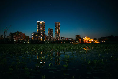 View of city lit up at night