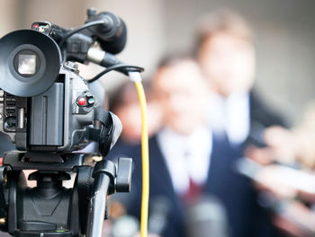 Close-up of man photographing