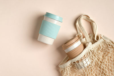 High angle view of wicker basket over white background