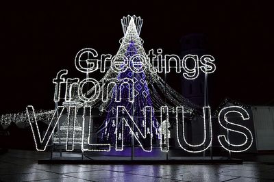 Illuminated christmas tree at night