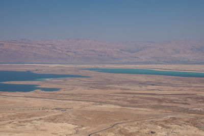 Scenic view of desert against sky