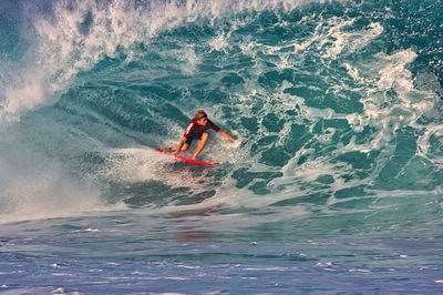 Man surfing in sea