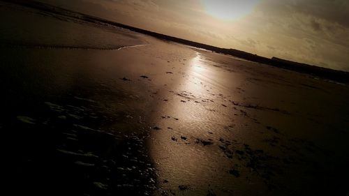 Scenic view of sea at sunset