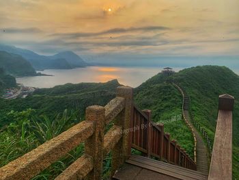 Scenic view of mountains against sky during sunset