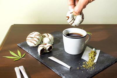 Midsection of person preparing food on table