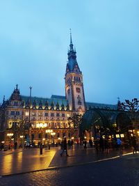 Illuminated buildings in city at night