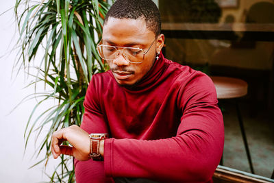 Portrait of young man wearing eyeglasses