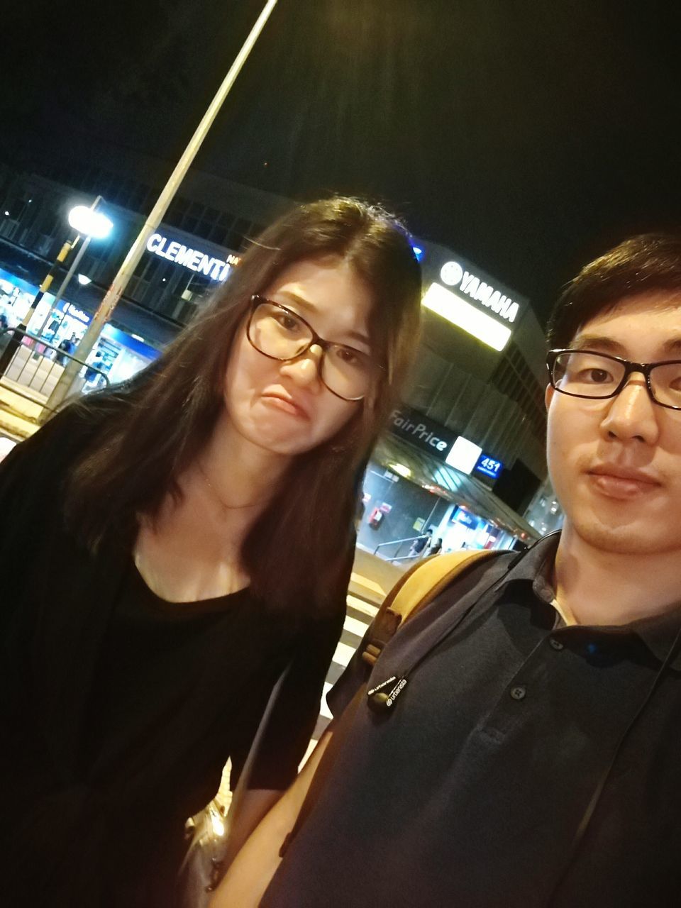 two people, city, night, nightlife, lifestyles, portrait, dating, heterosexual couple, eyeglasses, beautiful people, couple - relationship, looking at camera, girlfriend, women, young women, city life, beauty, men, people, togetherness, smiling, young adult, adults only, dj, adult, film industry, outdoors