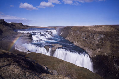 View of waterfall against sky