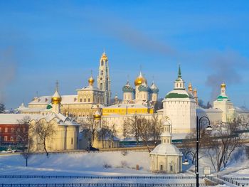 View of buildings against sky during winter