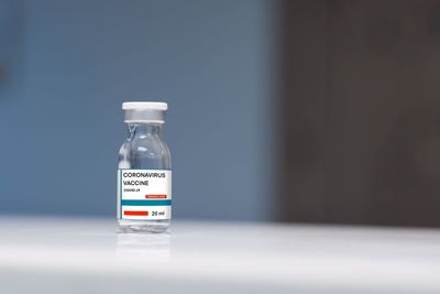 Close-up of glass bottle on table