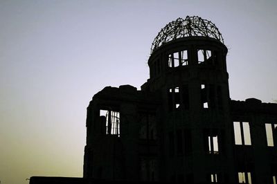 Low angle view of built structure against clear sky