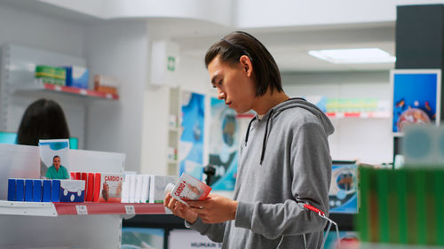 Young woman using mobile phone