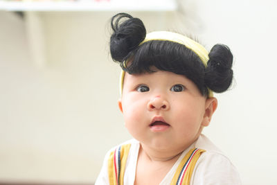 Portrait of cute boy looking away