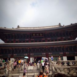 People in front of building