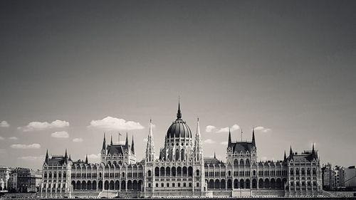 Buildings in city against sky