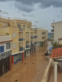 Buildings in city against sky