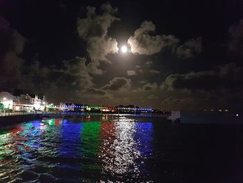 View of illuminated city at night