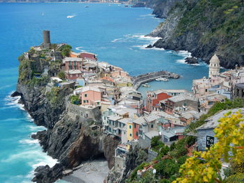 High angle view of town by sea