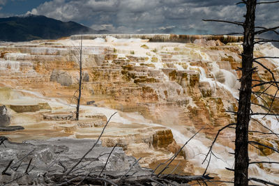 Aerial view of landscape with mountain in background