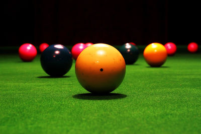 Close-up of pool balls on table