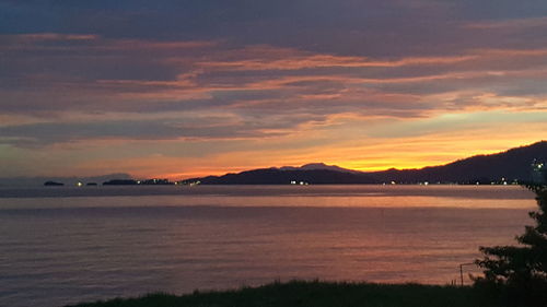 Scenic view of sea against sky at sunset