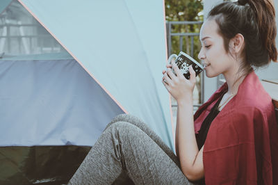 Series photo of young woman hand holding ceramic mug, positive emotion, chill and joyful