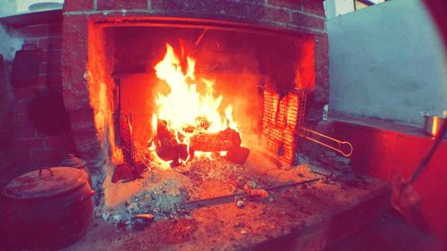 Fire burning in kitchen