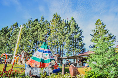 View of trees against blue sky