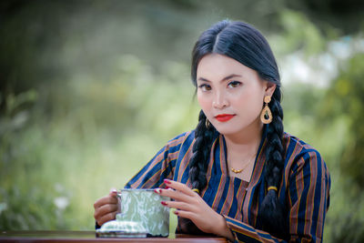 Young woman using mobile phone