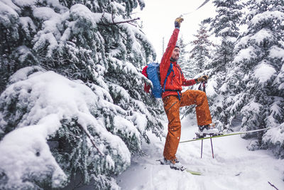 Man skiing on snowcapped mountain