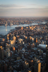 High angle view of city buildings against sky