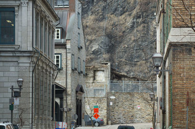 Buildings against mountain