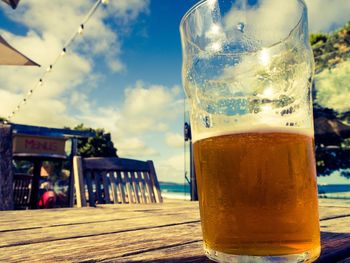 Close-up of drink against the sky