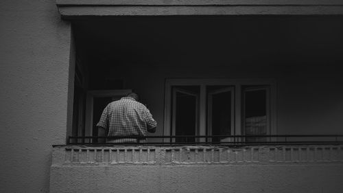 Woman seen through window