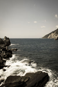 Scenic view of beach and sea against sky