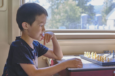 Portrait of boy looking at camera