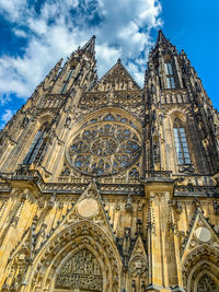 Low angle view of ornate building against sky