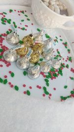 High angle view of christmas ornaments on table