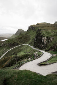 Scenic view of mountain road against sky