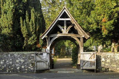 View of gate against trees