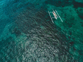 High angle view of sailboat in sea