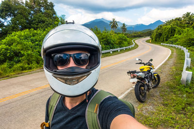 Portrait of man wearing helmet