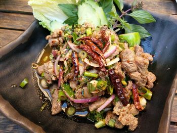 High angle view of spicy grilled thai beef salad. dinner in a gourmet thai restaurant in munich. 