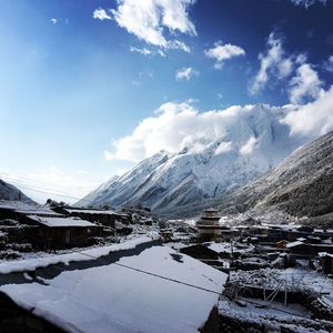 Snow covered mountains against sky