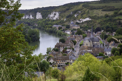 High angle view of river amidst buildings