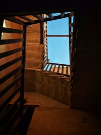 Low angle view of spiral staircase in building