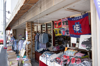 Clothes hanging in store for sale at market