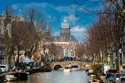 Canals, boats and beautiful architecture at the old central district in amsterdam