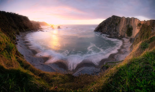 Scenic view of sea against sky during sunset